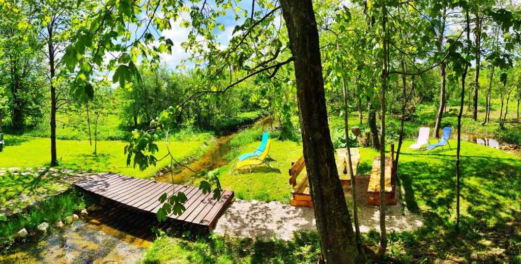 Garden and stream at Plitvice Streaming in Prijeboj, Croatia